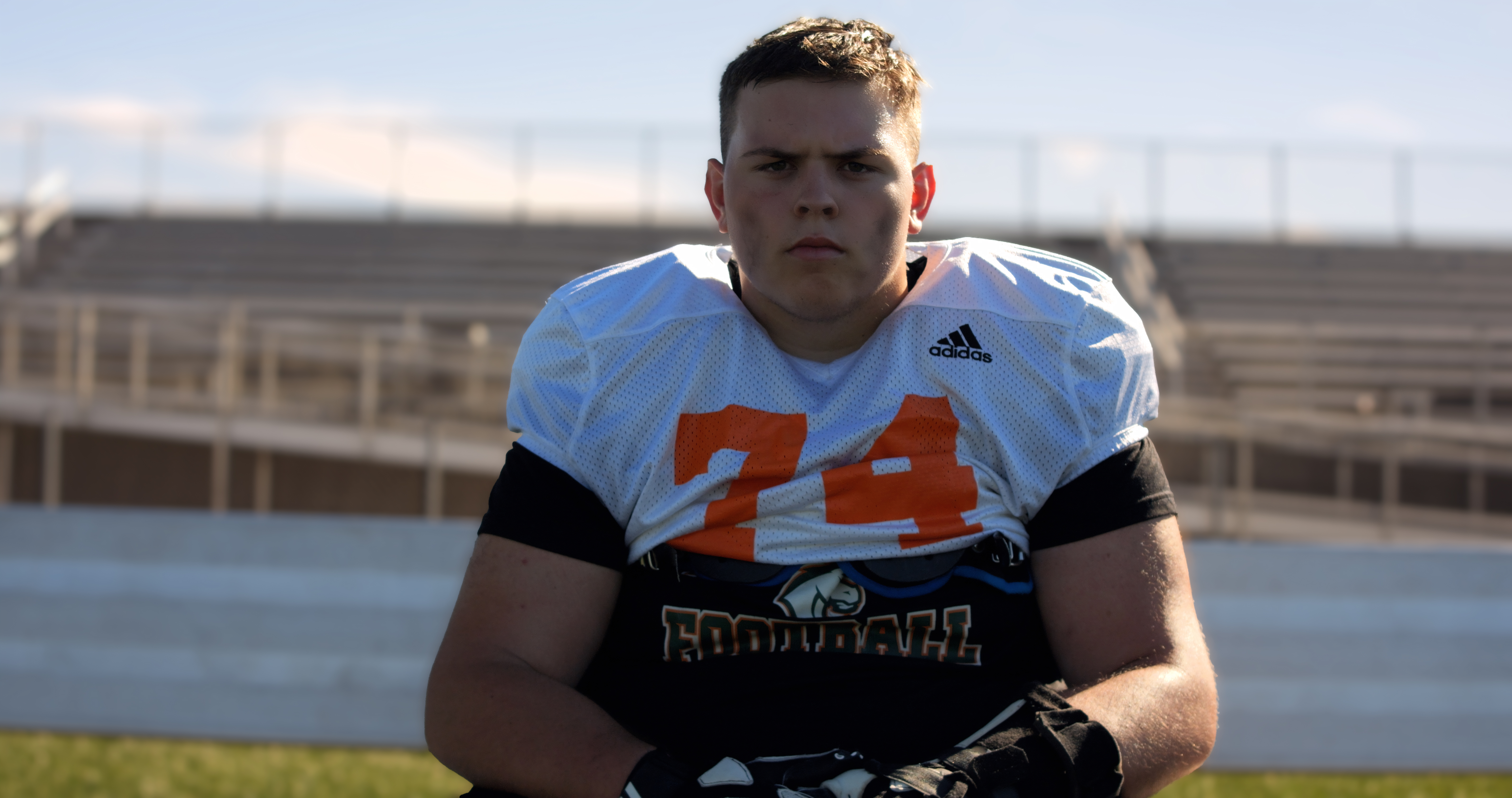 Head-on photo of Walker Johnson, a senior who plays football at Frederick Douglass High School.