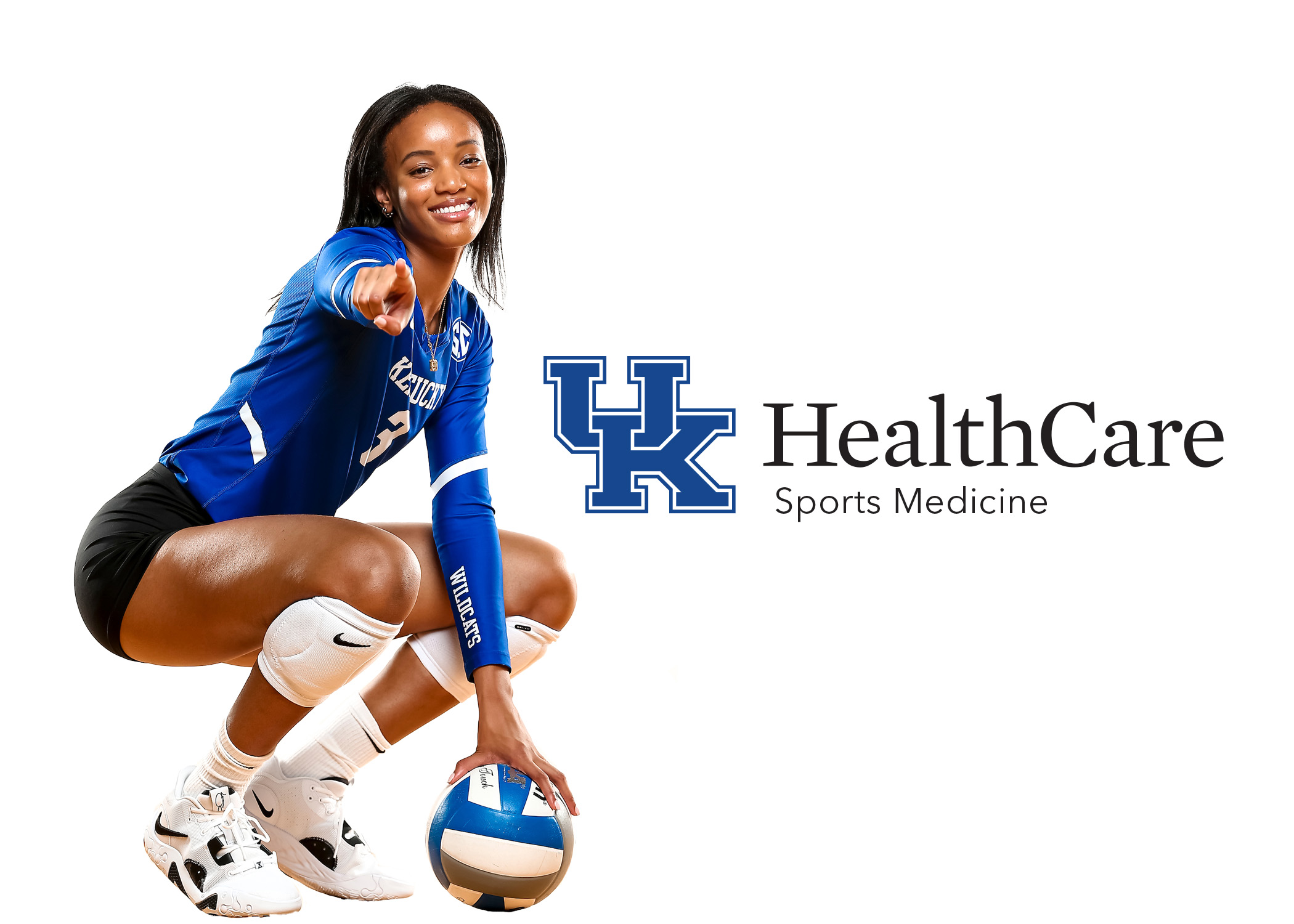 UK volleyball player Jordyn Williams adjacent to a UK Sports Medicine logo.