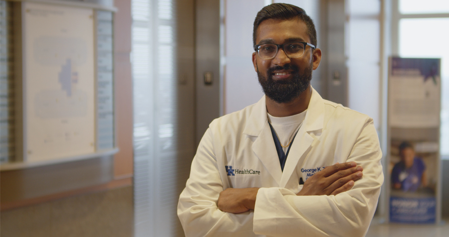 Dr. George Thomas, a minimally invasive GYN surgeon at UK HealthCare, smiles.