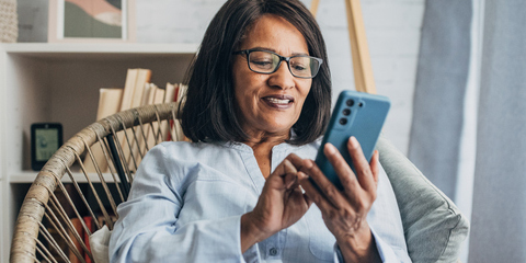 A woman uses her smartphone.