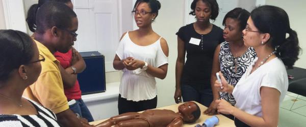 Dr. Asha Shenoi with students in Barbados