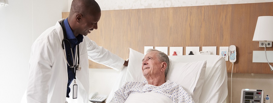 Doctor with patient in hospital. 