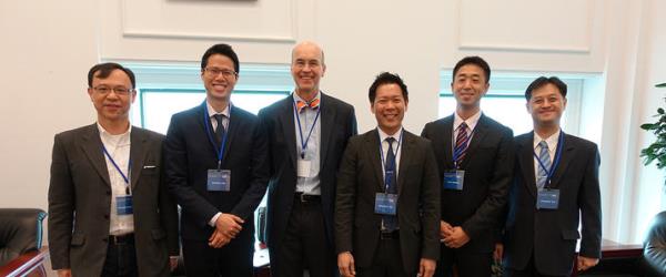 During a recent trip to Taiwan, Dr. Mark V. Williams (third from left) had the opportunity to share his expertise as a hospitalist and researcher with colleagues in Taiwan.