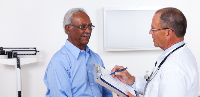 Patient speaks with his doctor