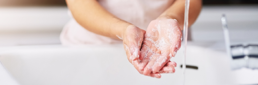 Washing hands with soap. 