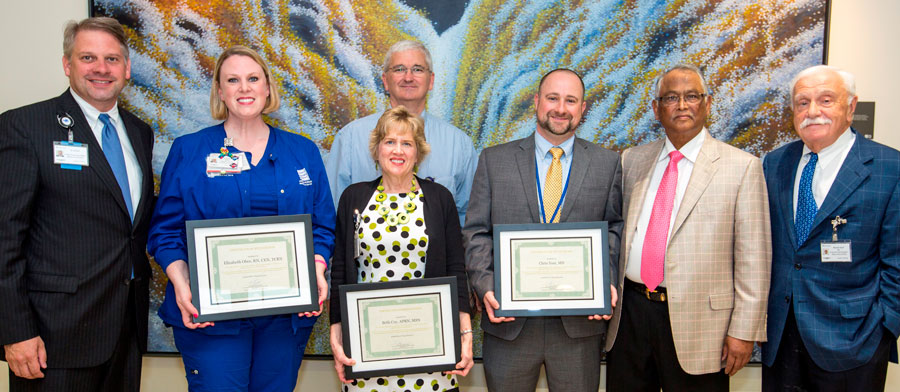 Saha Award winners for 2017 with Bo Cofield, Dr. Sibu Saha and Dr. Michael Karpf