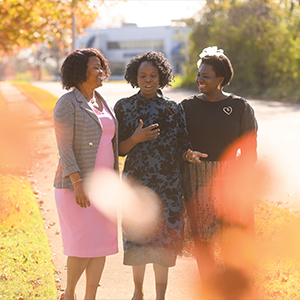 Dr. Adegboyega and her friends chat while on a walk.