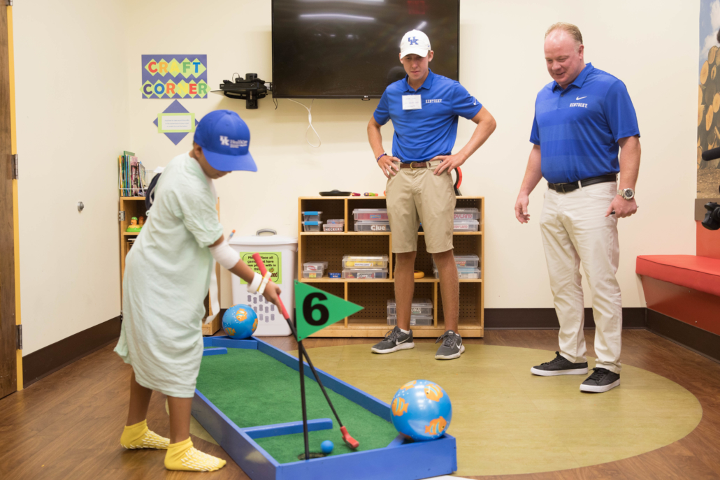 A patient putts.