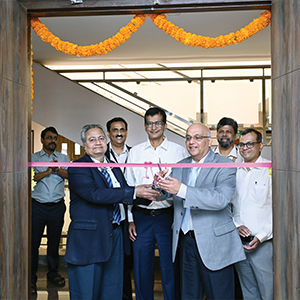 Dr. Rangnekar cuts ribbon