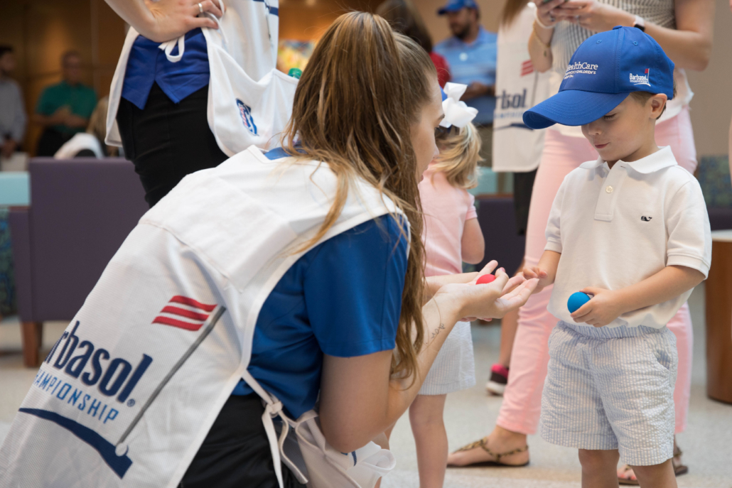 Young patient chooses a ball.