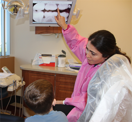 Christina Perez with a patient.