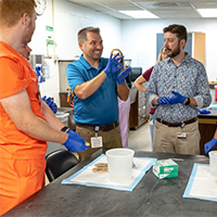 students and scientists participate in a deaf science program