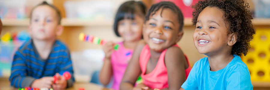 Diverse kids playing with blocks