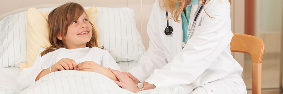 Girl smiling at doctor 