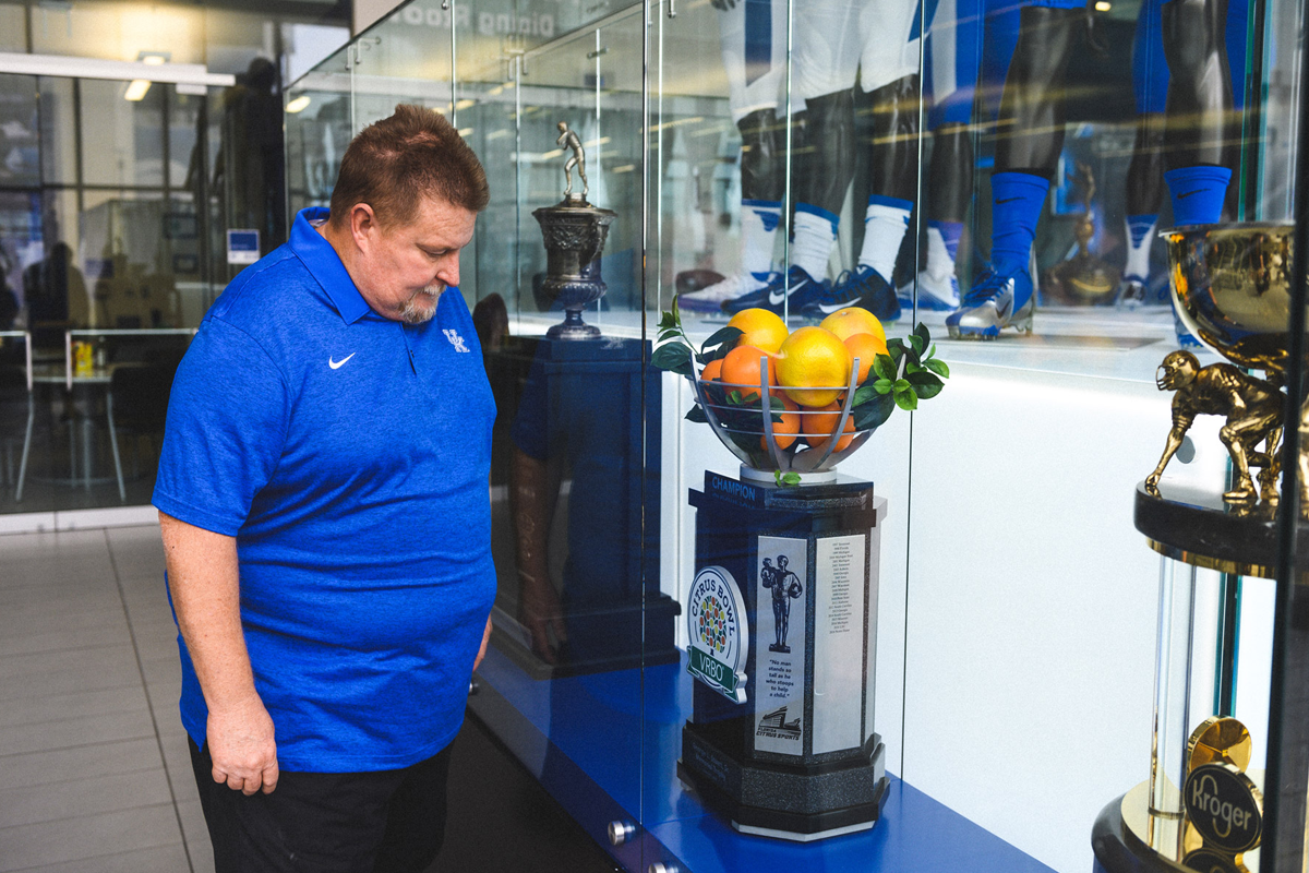 Jimmy Rhoades tours the football practice facility.