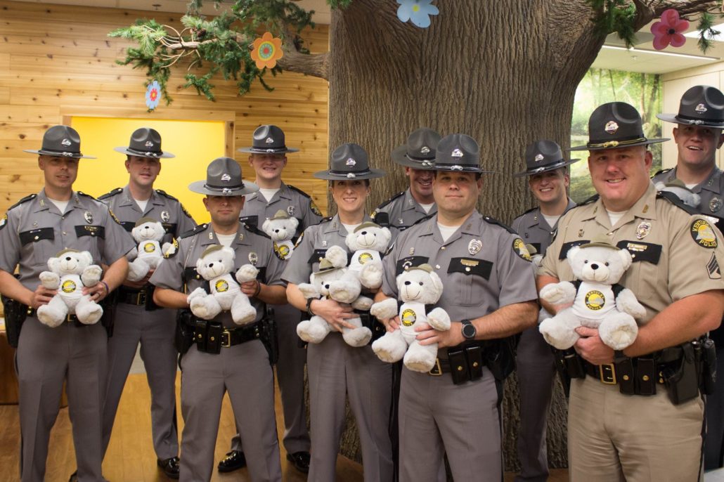 Kentucky State Troopers deliver teddy bears to Kentucky Children's Hospital patients.