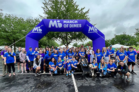 UK HealthCare team members gather under the archway for the March of Dimes March for Babies