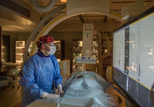 A physician looks at a stroke patient's images.