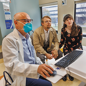 Sara Custer and husband meet with Dr. Zinner