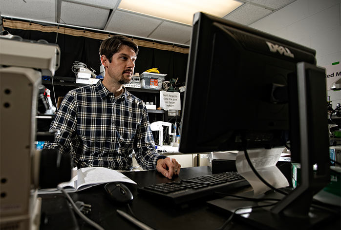 Jonathan Wenk on the computer