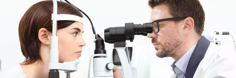 Woman getting her eyes examined