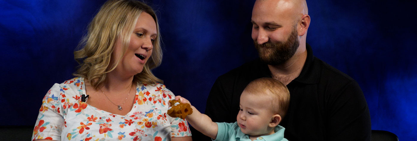 Taylor and Lauren Perkins with their son, Teddy.