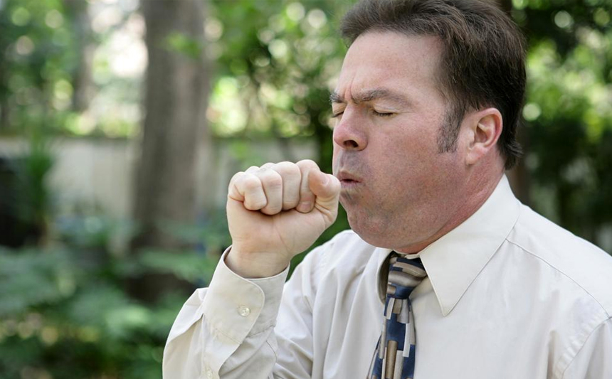 A man coughing.