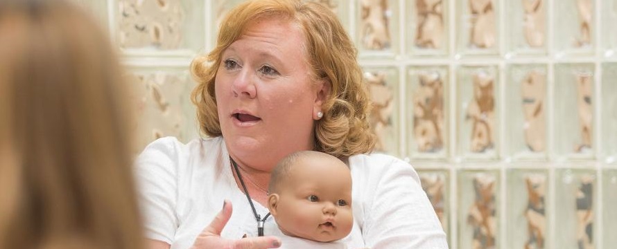 Nurse Nancy Jennings teaching a parenting class