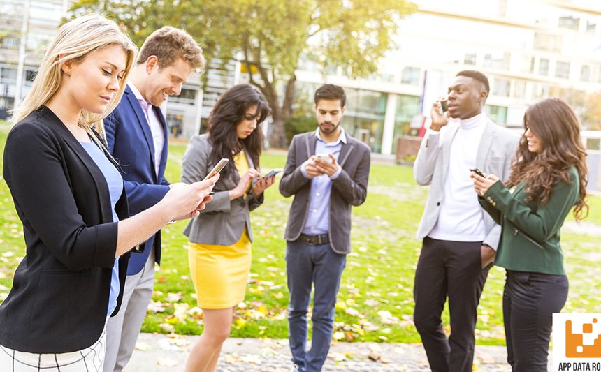 Young professionals using cellphones.