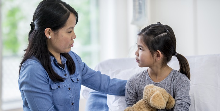 Mom talks to daughter in hospital.