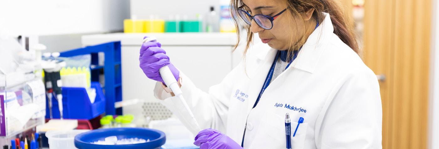 A researcher with the Barnstable Brown Diabetes and Obesity Research Center works in the lab. 