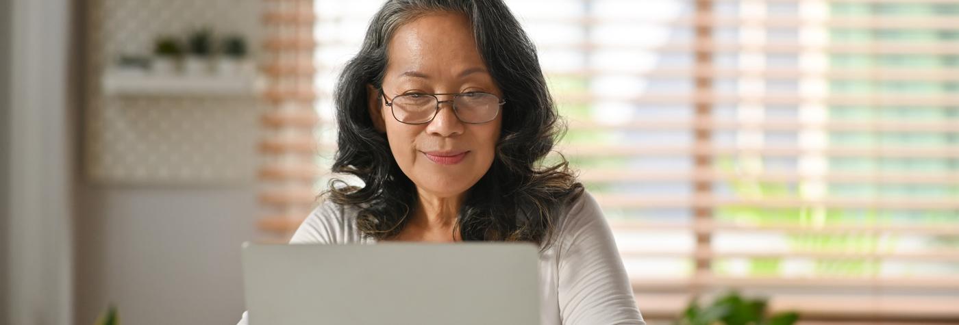 woman looking at a computer screen