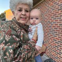 Gayle with her grandchild.