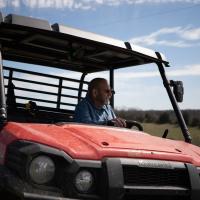 Camera angled from the front of a farm vehicle driven by Howard Galbreath