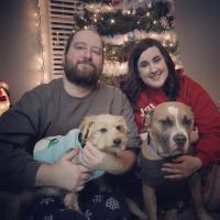 Garrett Dykes, his wife Kristin and their two dogs