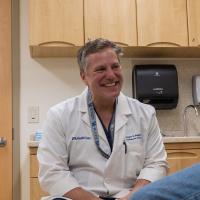 Dr. Raymond Wright in an exam room.