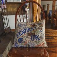 A pillow adorned with University of Kentucky imagery at Bruce's home.