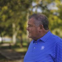 Bruce Drake looks around his farm.