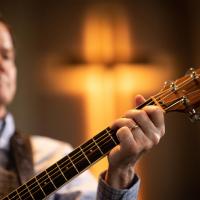 Bill Crawford playing guitar