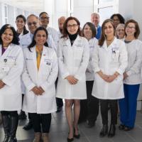 Dr. Siddharth Kapoor and his team at UK HealthCare’s Neuroscience Institute posing for a group photo in the hospital.