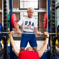 Joe and Cathy Marksteiner lifting weights together