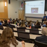 A photo of Michael giving that same presentation at the University of Florida but from the vantage point of one of the students.