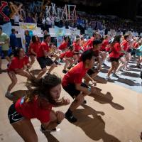 An action shot of DanceBlue volunteers mid-routine.