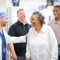 Priscilla’s cardiologist, Dr. Andrew Leventhal, stops in the hallway at UK HealthCare to talk to her.