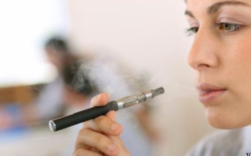 Woman smoking an e-cigarette